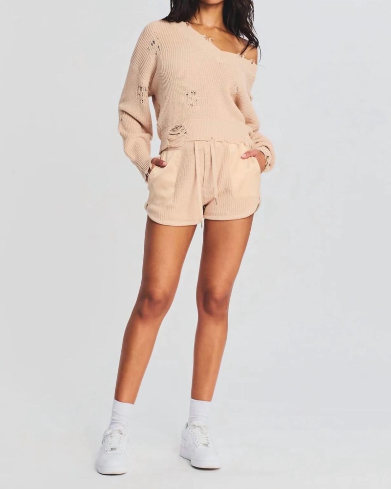 Front of a model wearing a size L Uma Short In Cappucino in Cappucino by SER.O.YA. | dia_product_style_image_id:356471